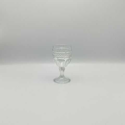 pressed wine glass with stem and facets
