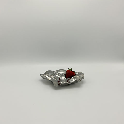 Lluis Clotet snail dish in stainless steel, strawberry for reference. 