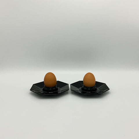 Eighties vintage egg holders from the Octime series. Made out of glossy, black tempered glass.