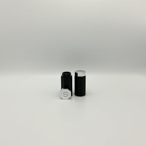 Pepper and salt shakers from the eighties Octime series by Arcoroc Luminarc. Octgonal shape. 